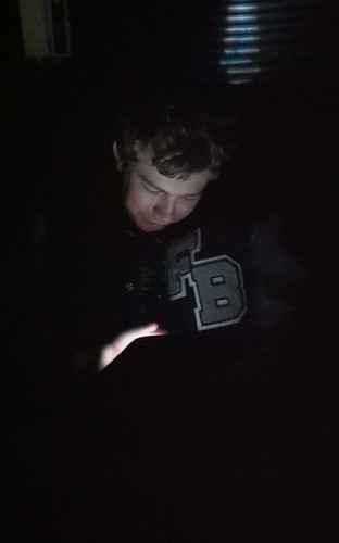 James on his iPad as he awaits rescue